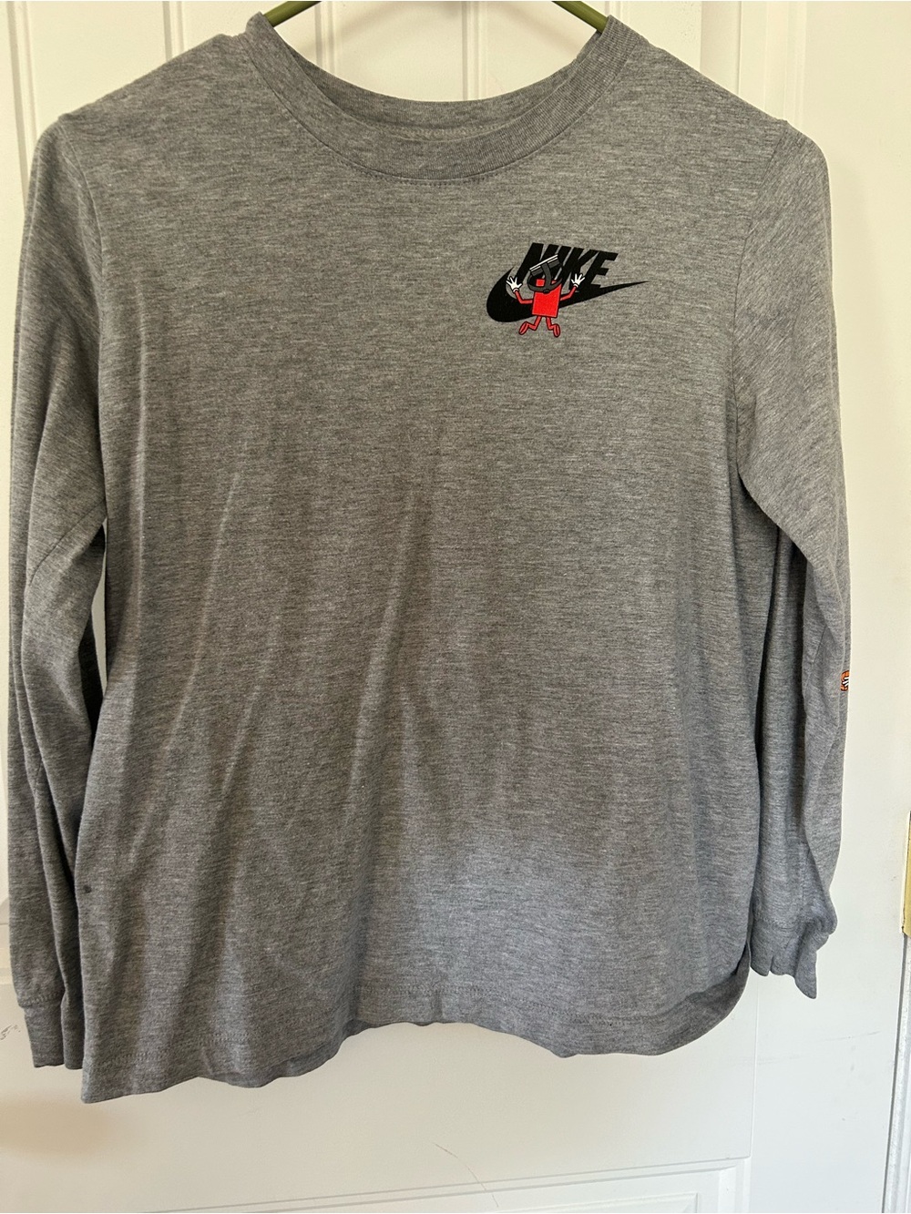 Nike Gray Tee with Black Swoosh and Boxy Character